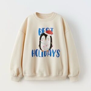 Zara Cream “Best Holidays” Penguin Sweatshirt
- 5-6 Years